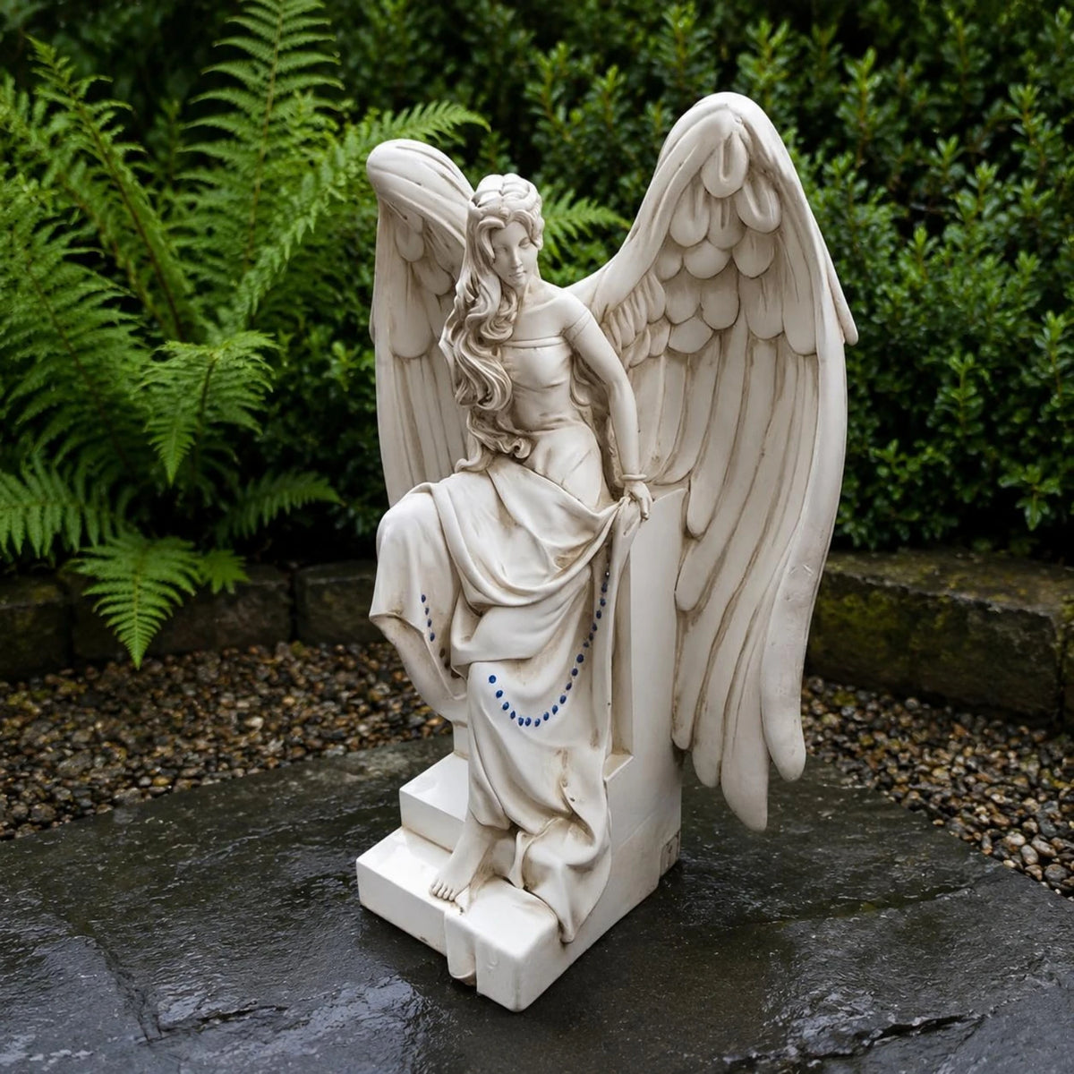 Seated White Angel Figurine with Feathered Wings