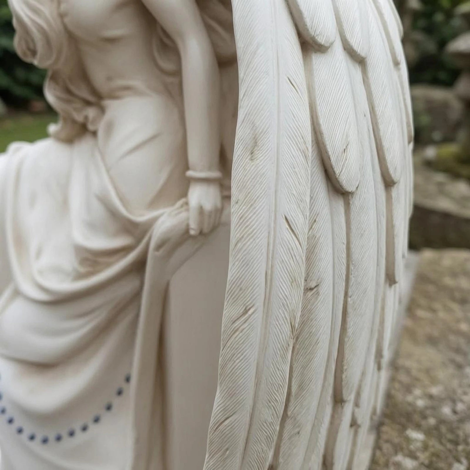 Seated White Angel Figurine with Feathered Wings